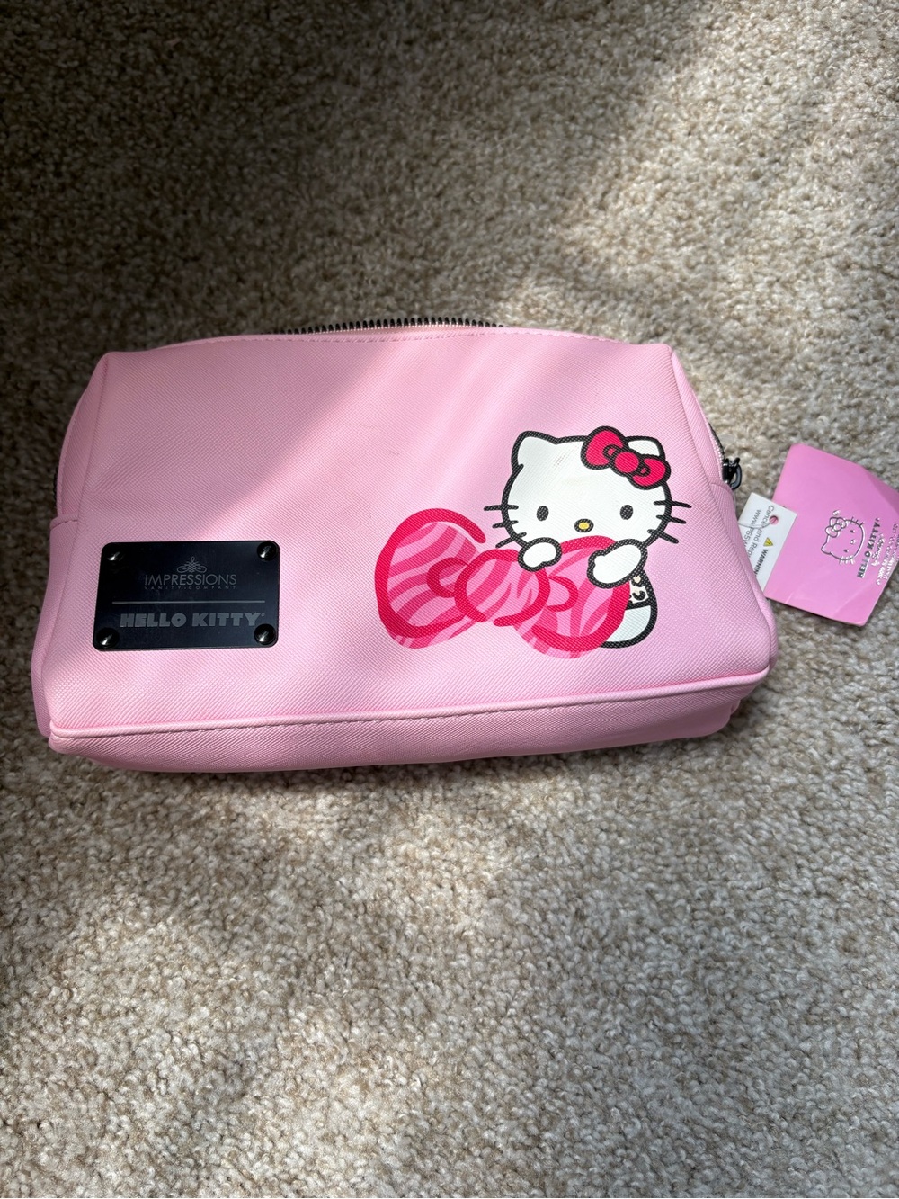 Impressions Hello Kitty Pink Cosmetic Pouch with Striped Bow Graphic